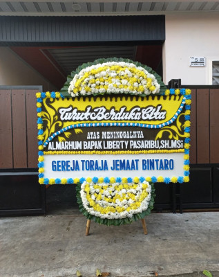 Papan Bunga Duka di Sindulang Dua